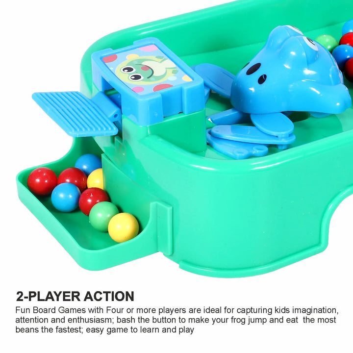 Toy game with frog and colorful balls on a green board