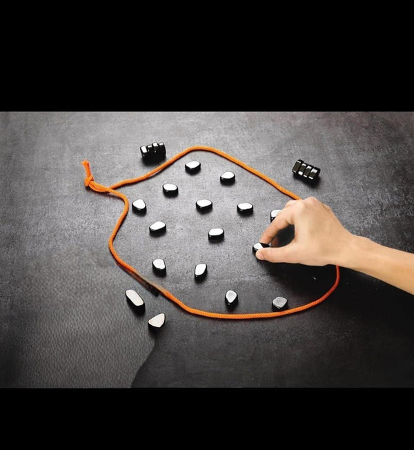 Magnetic puzzle strategy game with 24 colorful magnets