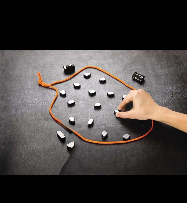 Magnetic puzzle strategy game with 24 colorful magnets