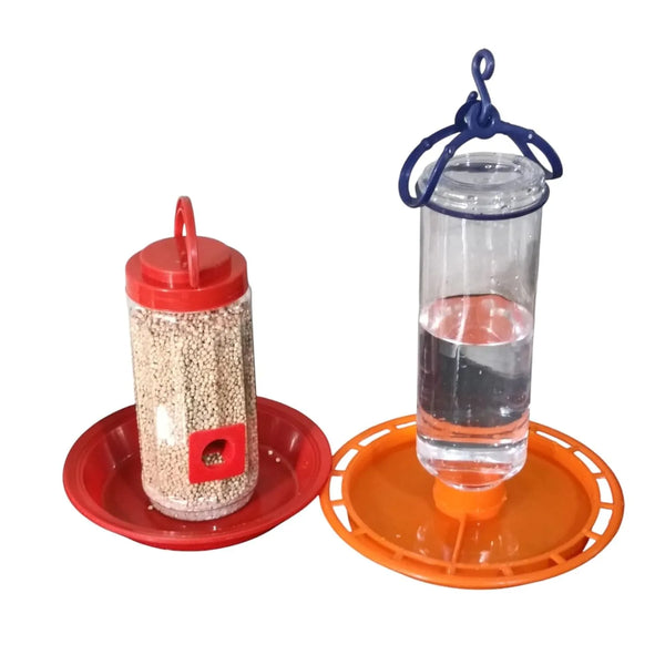 Bird feeder with green plastic base and hanging hook for outdoor use