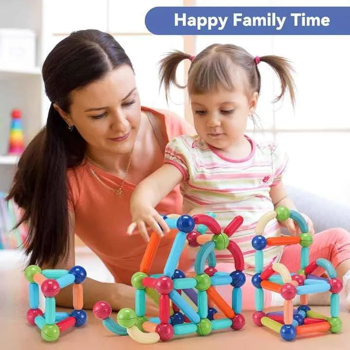 Woman and child playing with colorful magnetic building blocks, with 'Happy Family Time' text at the top.