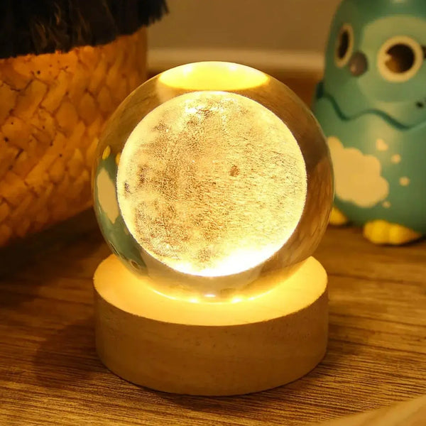 Vaayu‑E‑Store Galaxy Moon Crystal Ball Night Lamp on wooden LED base

Laser‑engraved crystal ball showing galaxy inside

USB-powered wooden base for galaxy crystal lamp