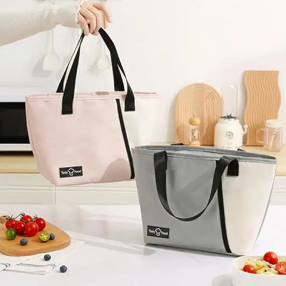 Portability: Caltero Insulated Lunch Bag in Hand

