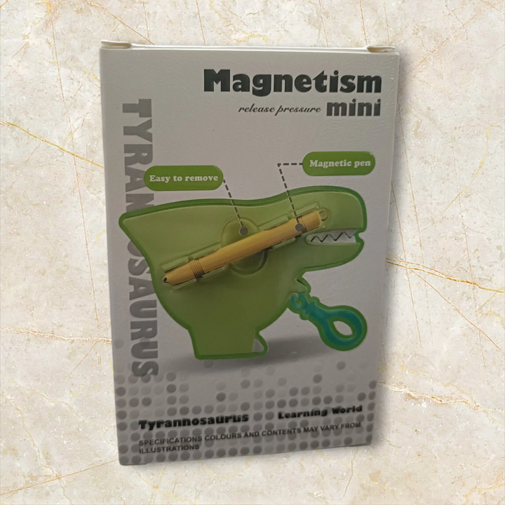 Box for a Tyrannosaurus-shaped magnetic pen on a textured surface  Vaayu-E-Store, vaayu, Vayu Magnatic Toys ,Games