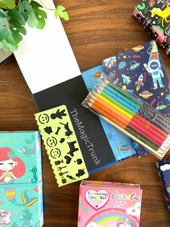 Coloring book for boys and girls with pencils