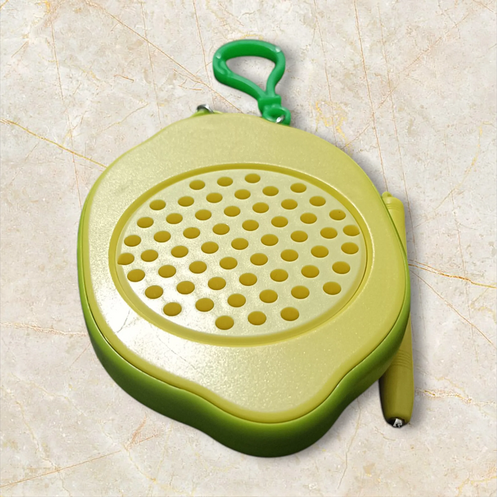 Green and beige plastic tool with a textured surface on a beige background, V Vaayu-E-Store, vaayu, Vayu Magnatic Toys ,Games