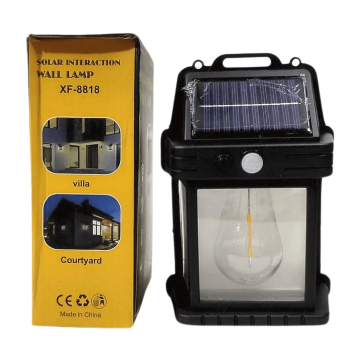 Solar wall lamp with packaging on a white background